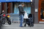 Amsterdam  11 januari 2014
Victor Reinier met vriendin en baby in kinderwagen.