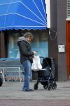 Amsterdam  11 januari 2014
Victor Reinier met vriendin en baby in kinderwagen.