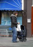 Amsterdam  11 januari 2014
Victor Reinier met vriendin en baby in kinderwagen.