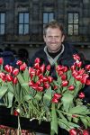 Amsterdam 21 januari 2017 
Boer Tom Groot bij event met tulpen bij paleis op de dam.