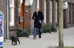 Amsterdam 20 januari 2017  
Tom Egbers laat bellend zijn hond uit.