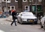 Amsterdam 20 januari 2017  
Tom Egbers laat bellend zijn hond uit.