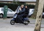 Amsterdam 27 januari 2018 
Hans Jorritsma met zijn vrouw en zoon op vespa scooter