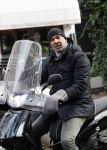 Amsterdam 22 januari 2018 
Ruud Gullit op zijn scooter in Amsterdam zuid