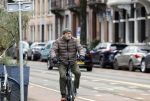 Amsterdam 17 januari 2022
Gijs Scholten v Aschat op de fiets in Amsterdam zuid
