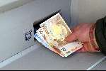 Eindhoven 1 januari 2002
Rijen mensen bij de pinautomaten voor Eurobiljetten