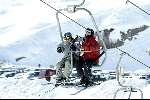 Zurs 23 februari 2003
Michael Schumacher skiend en samen met Norbert Haug
Stoeltjeslift     Wintersport