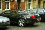 Amsterdam 22 februari 2004
Bram Moszkowicz in zijn nieuwe Bentley coupe.