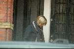 Amsterdam 30 januari 2004
Tooske  Breugem komt naar buiten bij het huis van Bastiaan Ragas