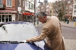 Amsterdam 26 februari 2005
Bram Moszkowicz krijgt bekeuring voor fout parkeren en een te kleine nummerplaat met zijn  ferrari