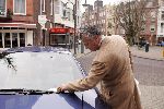 Amsterdam 26 februari 2005
Bram Moszkowicz krijgt bekeuring voor fout parkeren en een te kleine nummerplaat met zijn  ferrari