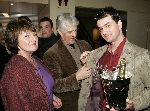 Bussum 16 februari 2005
Uitreiking gouden harpen in t spant in bussum.
Kasper v Kooten met champagne en ouders Kees v Kooten