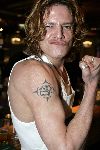 Amsterdam 23 februari 2005
Presentatie dvd Popeye in restaurant Fifteen.
Tygo Gernandt  met Tatoeage