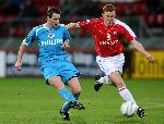 Utrecht, 8 Februari 2006 Kompetitiewedstrijd FC Utrecht-PSV, eindstand 1-2 door 2 doelpunten van Jefferson Farfan
Seizoen 2005/2006 
Andre Ooijer in duel met Hans Somers