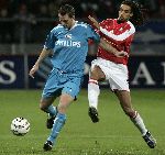 Utrecht, 8 Februari 2006 Kompetitiewedstrijd FC Utrecht-PSV, eindstand 1-2 door 2 doelpunten van Jefferson Farfan
Seizoen 2005/2006 
Andre Ooijer in duel met Robin Nelisse