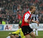 Rotterdam, 5 februari 2006  Seizoen 2005/2006 Kompetitiewedstrijd Feyenoord-AJAX, eindstand 3-2
Dirk Kuyt blij na zijn doelpunt
©Edwin van Zandvoort