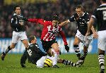 Eindhoven,11 Februari 2006 Kompetitiewedstrijd PSV-Heracles, eindstand 1-0 Seizoen 2005/2006
Ibrahim Afellay in duel met Peter Reekers en liggend Stefaan Tanghe