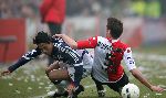 Rotterdam, 5 februari 2006  Seizoen 2005/2006 Kompetitiewedstrijd Feyenoord-AJAX, eindstand 3-2
Pascal Bosschaart in duel met Mauro Rosales
©Edwin van Zandvoort