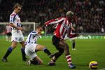 Eindhoven, 20 Januari 2007 Eerste wedstrijd na winterstop Kompetitiewedstrijd tussen PSV-SC Heerenveen, eindstand 3-1 Seizoen2006/2007
Arouna Kone is Jakob Poulsen en Paul Bosvelt de baas
Foto Peter Smulders BV Eindhoven