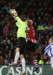 Eindhoven, 20 Januari 2007 Eerste wedstrijd na winterstop Kompetitiewedstrijd tussen PSV-SC Heerenveen, eindstand 3-1 Seizoen2006/2007
Arouna Kone komt net te laat
Doelman Brian Vanderbuschhe is de situatie meester