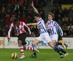 Eindhoven, 20 Januari 2007 Eerste wedstrijd na winterstop Kompetitiewedstrijd tussen PSV-SC Heerenveen, eindstand 3-1 Seizoen2006/2007
Jefferson Farfan is Michael dingsdag te snel af