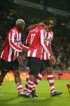 Eindhoven, 25 November 2006
PSV-FC Utrecht, eindstand 5-0 Kompetitie Seizoen 2006/2007
Jefferson Farfan wordt gefeliciteerd door Patrick Kluivert en Arouna Kone
Foto Ronald Otter