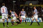 Eindhoven, 20 Januari 2007 Eerste wedstrijd na winterstop Kompetitiewedstrijd tussen PSV-SC Heerenveen, eindstand 3-1 Seizoen2006/2007
Mika Vayrynen met een mooie omhaal, Andre Hanssen, Michel Breuer en Michael Dingsdag kijken toe