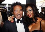 Amsterdam 8 december 2011
Openings en VIP avond van de miljonairfair in de RAI. Ronnie Rosenbaum met vriendin
Peter Smulders bv