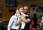 Curacao 8 januari 2012
Sunnery james haalt vrouw en Doutzen Kroes en zoon Phyllon op op het vliegveld van Curacao.
Peter Smulders bv