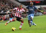 Eindhoven, 30 Januari 2013
1/4 Finale KNVB Beker PSV-Feyenoord, Seizoen 2012-2013, eindstand 2-1
Jeremain Lens wordt zwaar verdeigd door Bruno Martins Indi
Foto Peter Smulders BV