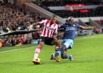 Eindhoven, 30 Januari 2013
1/4 Finale KNVB Beker PSV-Feyenoord, Seizoen 2012-2013, eindstand 2-1
Jeremain Lens wordt zwaar verdeigd door Bruno Martins Indi
Foto Peter Smulders BV
