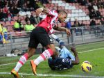 Eindhoven, 30 Januari 2013
1/4 Finale KNVB Beker PSV-Feyenoord, Seizoen 2012-2013, eindstand 2-1
Jeremain Lens wordt zwaar verdeigd door Bruno Martins Indi
Foto Peter Smulders BV