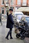Amsterdam 7 januari 2014
Lieke v Lexmond  achter de kinderwagen in Amsterdam zuid.