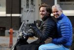 Amsterdam 4 december 2015 
Dries Roelvink met zijn zoon Donnie op de vespa scooter