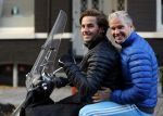 Amsterdam 4 december 2015 
Dries Roelvink met zijn zoon Donnie op de vespa scooter