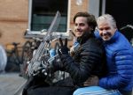 Amsterdam 4 december 2015 
Dries Roelvink met zijn zoon Donnie op de vespa scooter