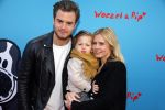 Amsterdam 17 januari 2016
Premiere Woezel en Pip in Tuschinski. Jim Bakkum met Bettina Holwerda en hun zoon