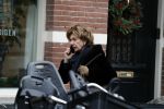 Amsterdam 19 december 2017 
Neelie Kroes bellend op straat in Amsterdam zuid