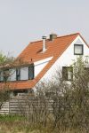 Bergen aan zee 6 mei 2006
Youp van t Hek  en  Debbie Petter hun vakantiehuis. op de schoorsteen zitten 2 witte duiven
Peter Smulders bv
