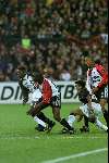 Rotterdam, 20 december 1998
Feyenoord-AJAX, eindstand 1-1
v.l.n.r.: Kofi Mensah, Ulrich v Gobbel, Wamberto en  Christian Gyan