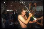 Rob Witschge met een fles champagne  in kleedlokaal nadat Feyenoord landskampioen is geworden