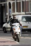 Amsterdam 11 januari 2005
Regilio Tuur op scooter in Amsterdam