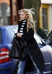 Amsterdam 13 januari 2006
Angela Kluivert met mini cooper cabrio winkelend