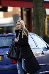 Amsterdam 13 januari 2006
Angela Kluivert met mini cooper cabrio winkelend