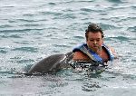 Curacao 6 januari 2006
Benno de Leeuw met dolfijnen zwemmen  op curacao