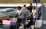 Schiphol 20 juni 2007
Danny Landzaat met vrouw en baby op schiphol.