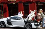 Amsterdam 4 juli 2012
Afrojack (Nick v d Wall) met zijn moeder in AUDI R8 op de pc hooftstraat.
Peter Smulders bv