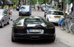 Amsterdam/Amstelveen 6 juli 2012
Badr Hari en Estelle Cruijff op terras en op weg naar reisburo in Lamborghini.
Peter Smulders bv