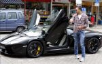Amsterdam/Amstelveen 6 juli 2012
Badr Hari en Estelle Cruijff op terras en op weg naar reisburo in Lamborghini.
Peter Smulders bv