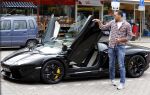 Amsterdam/Amstelveen 6 juli 2012
Badr Hari en Estelle Cruijff op terras en op weg naar reisburo in Lamborghini.
Peter Smulders bv